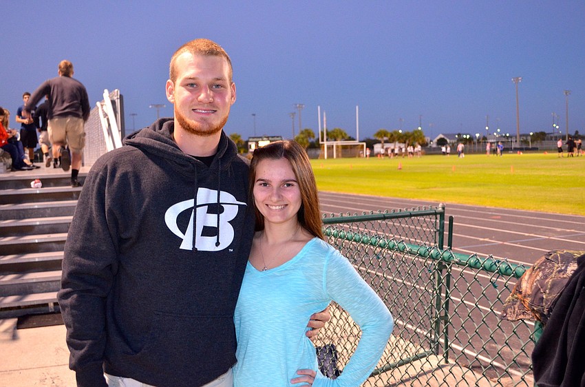 Beau Gilmore and Brittany Byerley hang out with friends.