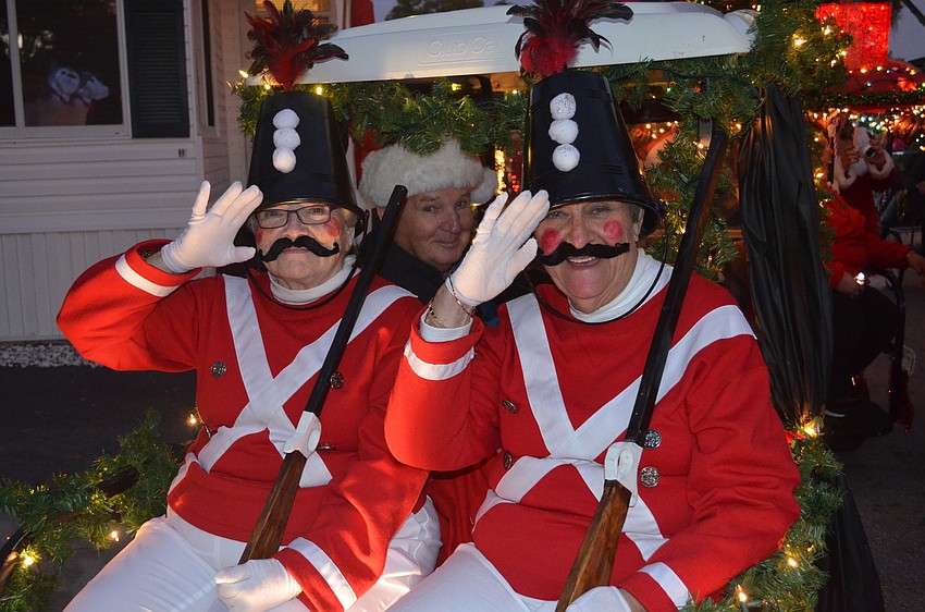George Allen watches Janet Gelinas and Helen Allen get into character.