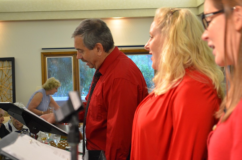 Singers Timothy Oâ€™Conner, Cami Wyatt and Michelle Grantham performed Christmas carols and songs for guests.