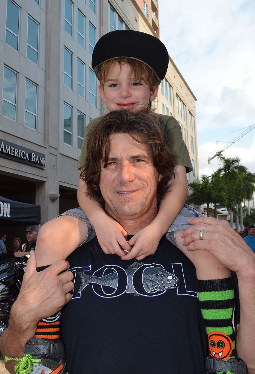 Doug and Chase Fagen stroll through downtown Sarasota for Thunder by the Bay.