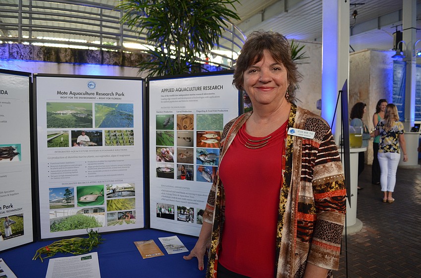 Senior scientist Kevan Main displays her work on integrated aquaculture systems.