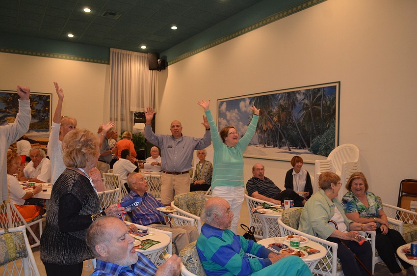 Residents of the Shore cheer for a Seahawks touchdown.