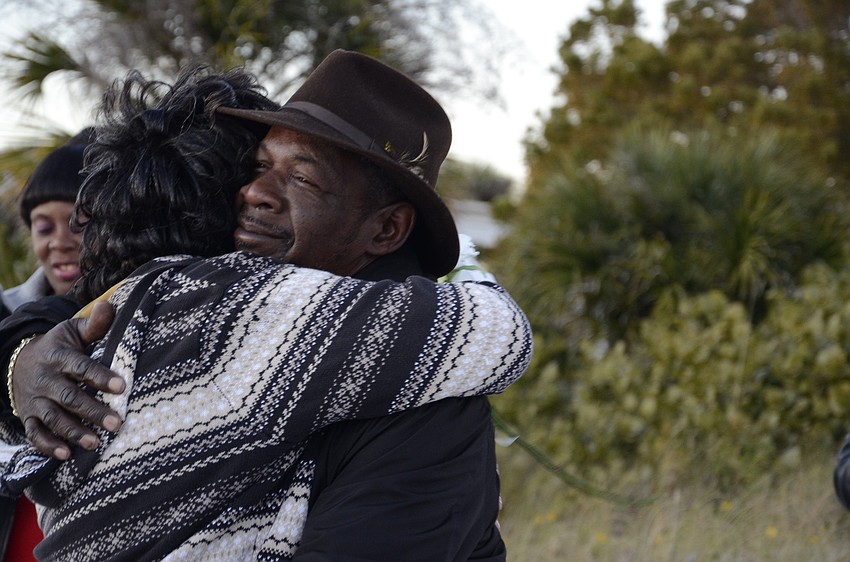 Mary Bryant hugs her husband, Eddie, after the ceremony.