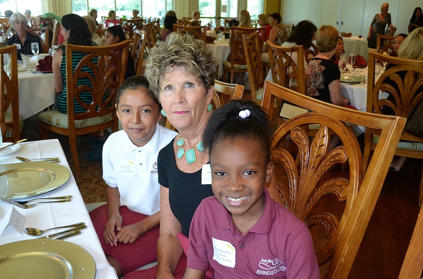 Karla Garcia, Jane Paschke and Dontravia Brantley spend time together before lunch.