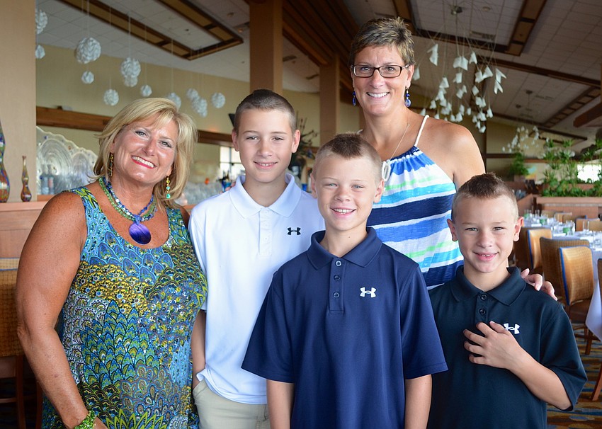 Jan Jordan with Colin, Alex and Sam Heintz and their mother, Kristin