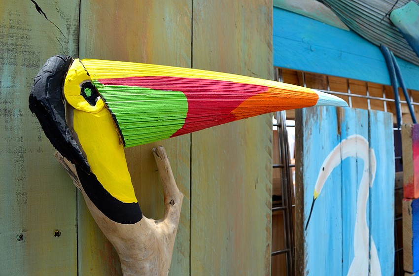 Mike Farley created this piece with found materials, like wood and palm fronds.