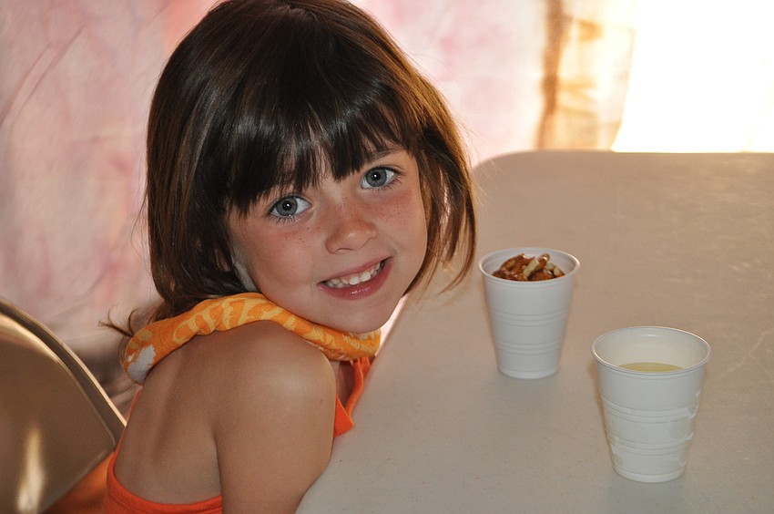 Mya Williams, 4, says she enjoys Vacation Bible School, but misses her mom.