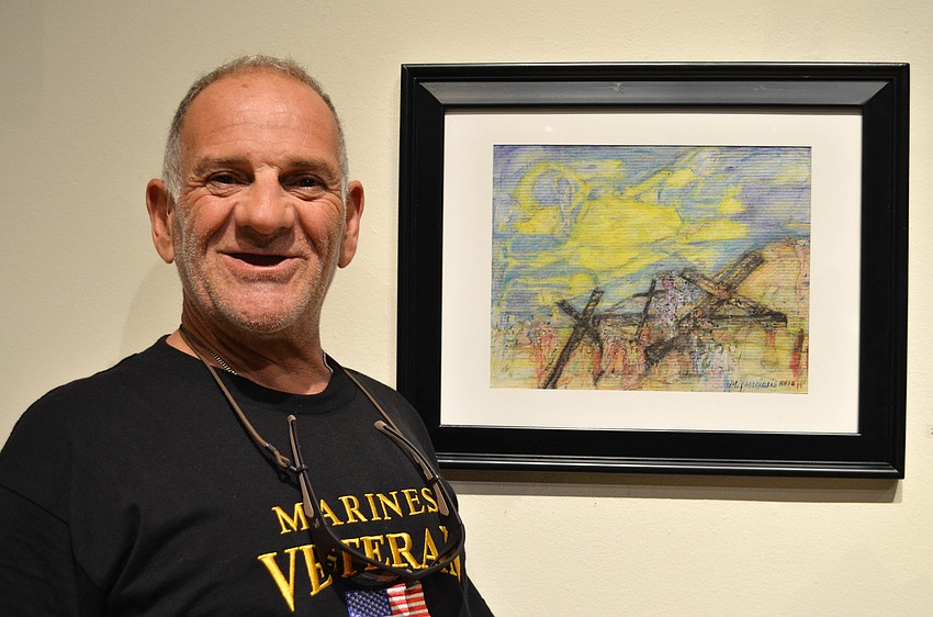 Michael Panagiotis with his work