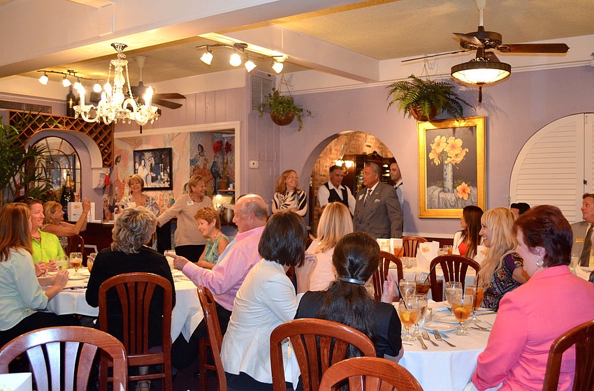 Attendees are told about CafÃ© Lâ€™Europeâ€™s summer specials.