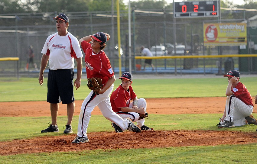 Sarasota American relief pitcher Jack Carney warms up after coming on in the second inning.