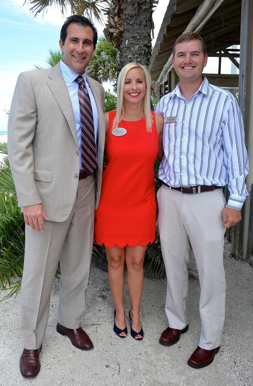 Anthony Garcia, of Alvarez Garcia, with Kelly and Courtland Hunt, I3 Lending