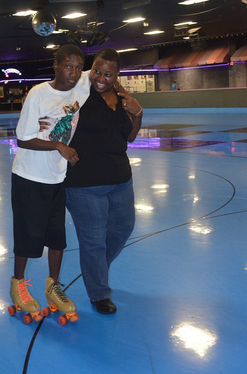 Xavier Gray and Jauana Johson skate.