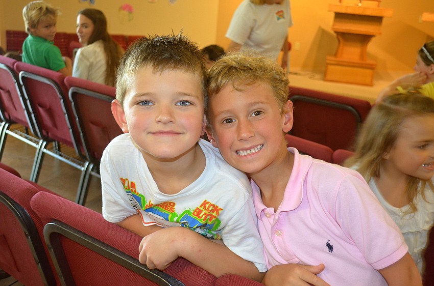 Tristen Birkley and Jesse Gullett cool down after outdoor games.