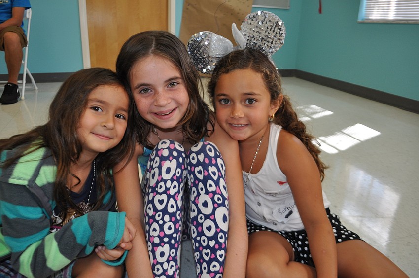 Sabina Alvarez, Ava Boot-Handor and and Sofia Sampaio enjoy the day's festivities.