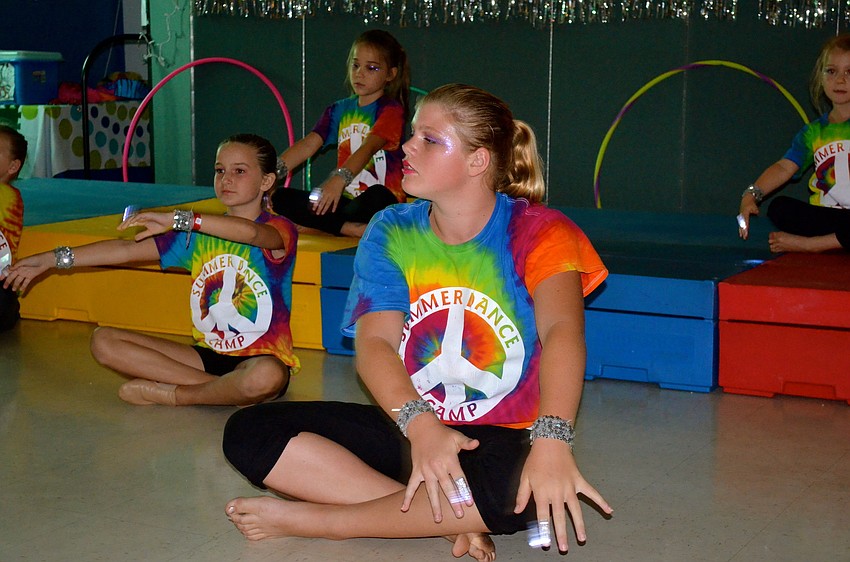 Taylor Woodring leads a dance to 