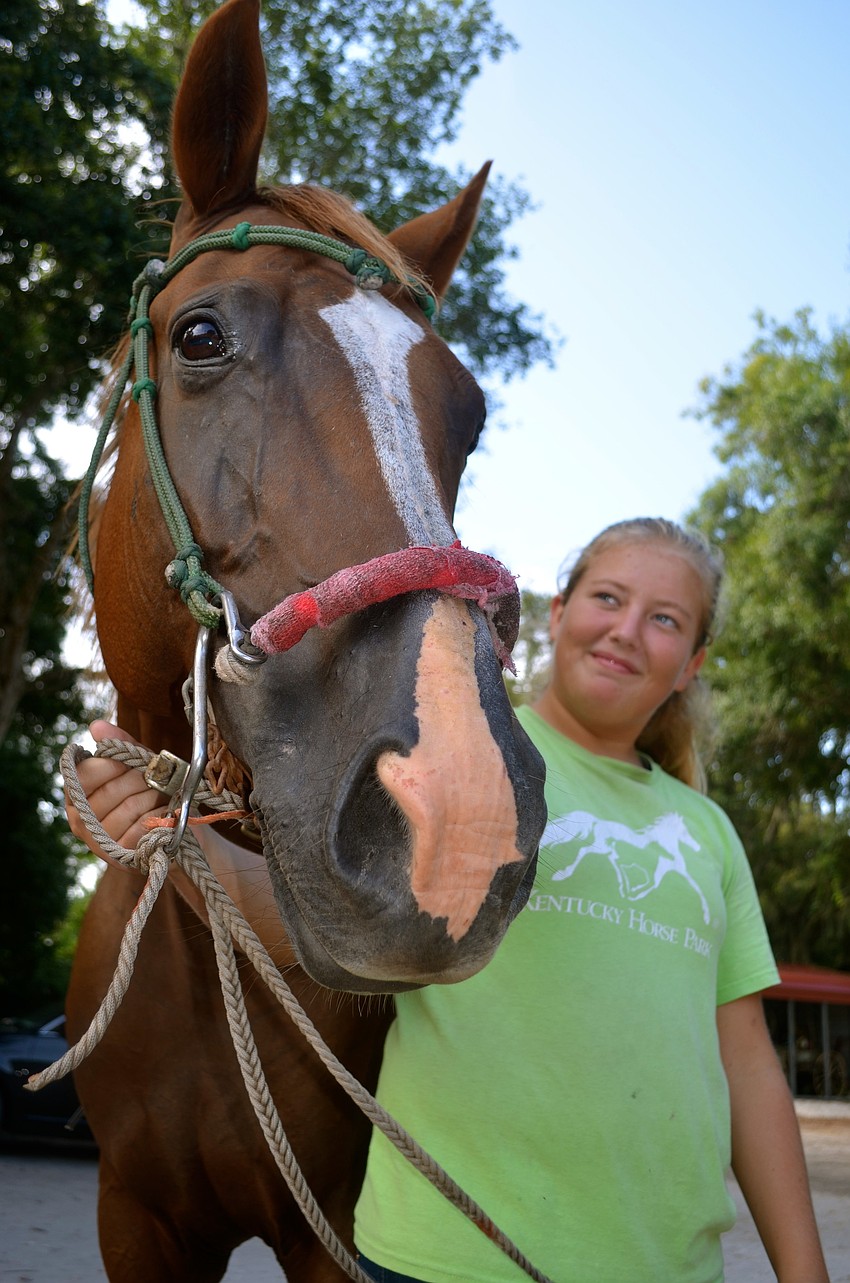 Shelby Morrow shows off Misty.