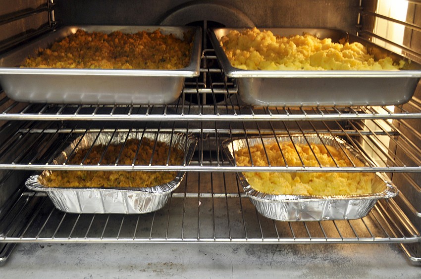 Longboat Island Chapel members brought the trimmings to be served at the Thanksgiving Dinner.