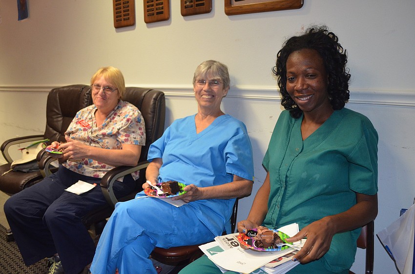 Caretakers Lauren Robinson, Linda Harp and Carsha Evans