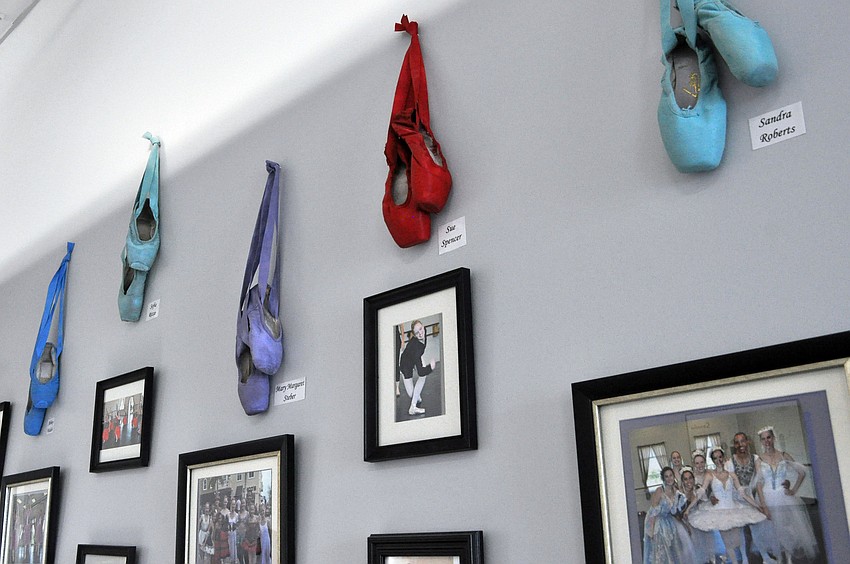 Photos and ballerina slippers adorn the walls in the new School of Russian Ballet.