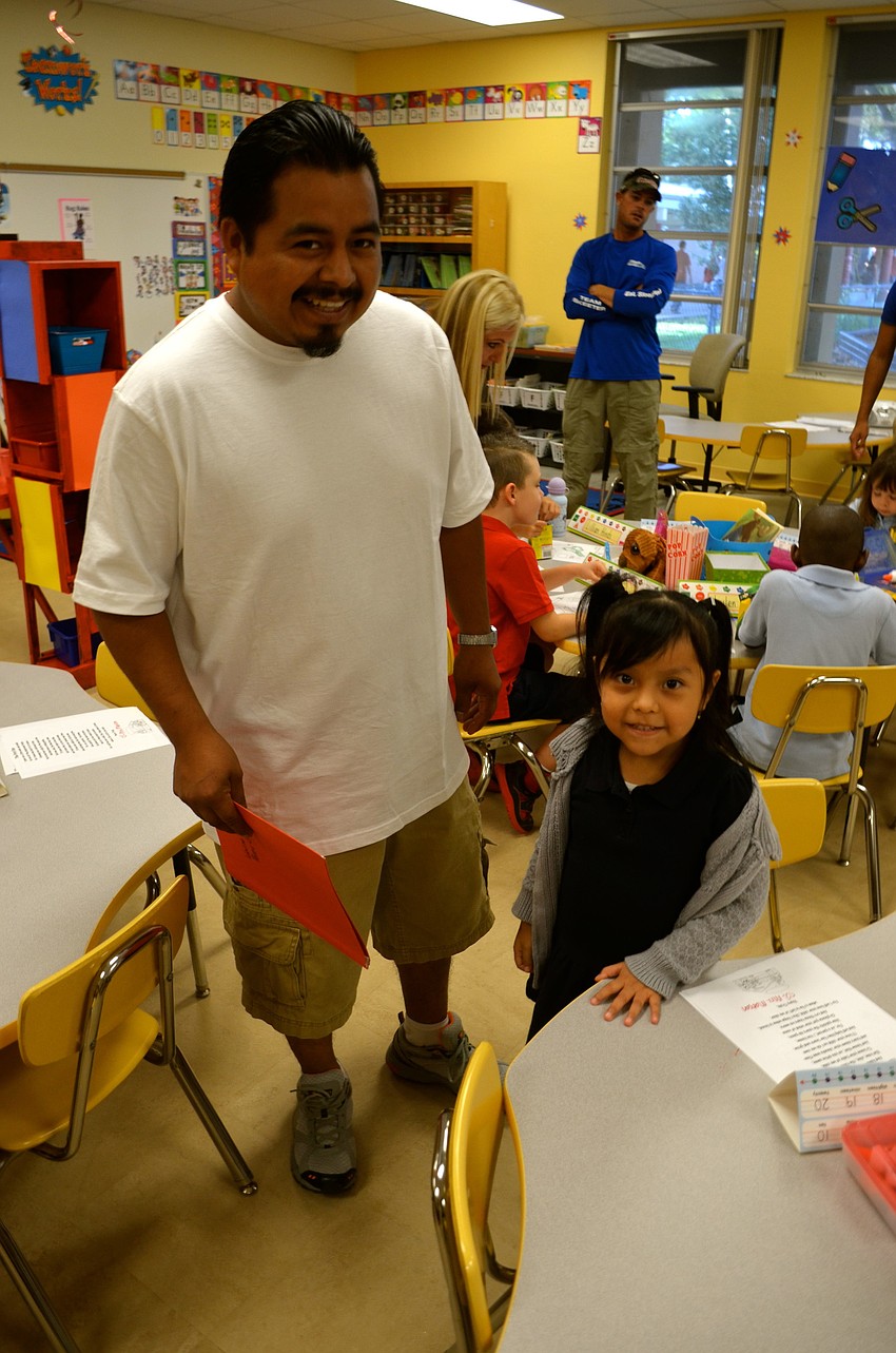 Luis Perez drops off his daughter, Idaliz.