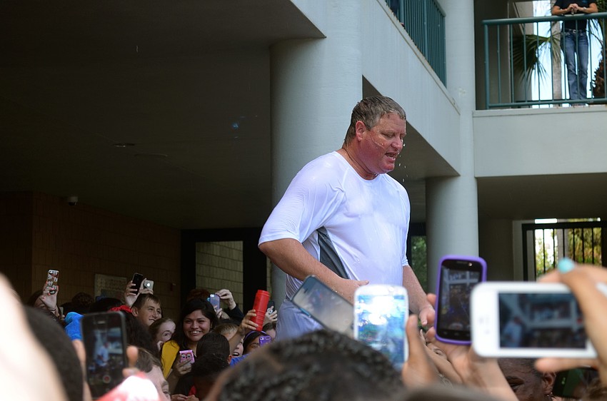 Deputy Carl McClellan completes the ALS Ice Bucket Challenge.