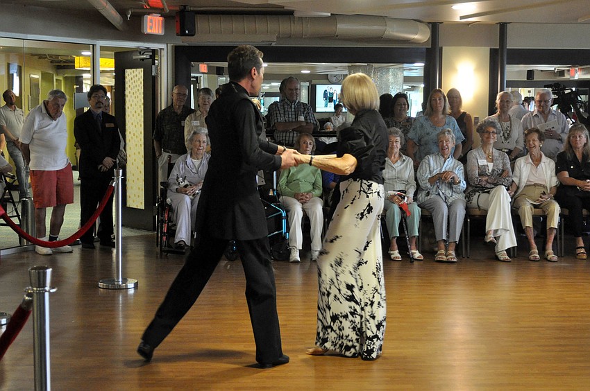 Gloria Moss and Jim Helbrich did a waltz in memory of Joanne Hastings at the Plymouth Harbor Wellness Center ribbon cutting ceremony.