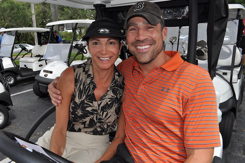 Carol Williams and Adam Jaco play on the same foursome.