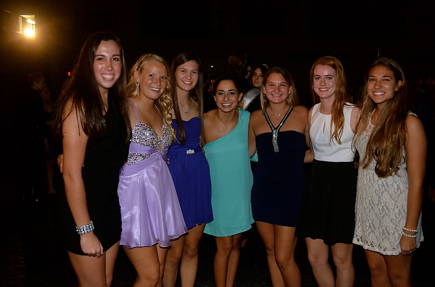 Student government members pose in their homecoming formal wear.