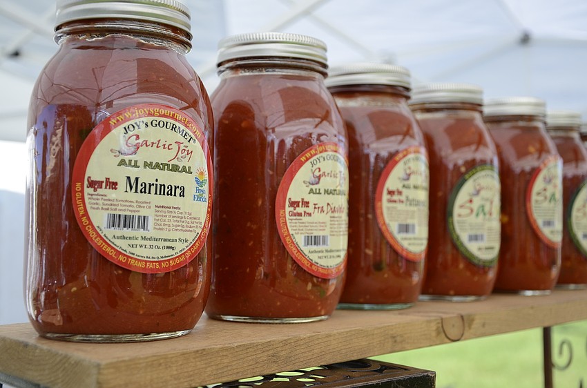 The market vendors sell a variety of products, from salsa to flowers. Other vendors are artists and sell their work.