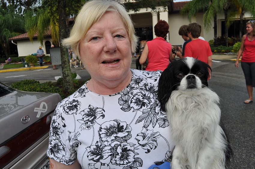Carol Luzio brings Sadie to her first animal blessing.