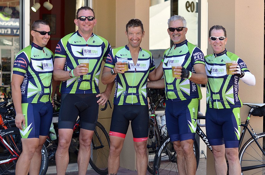 Richard Traugott, Sean Dotson, Julian Angus, Gary Roger and Shaun Merriman celebrate finishing the 220 mile Ride Across Florida for Team Tony with cold beer.
