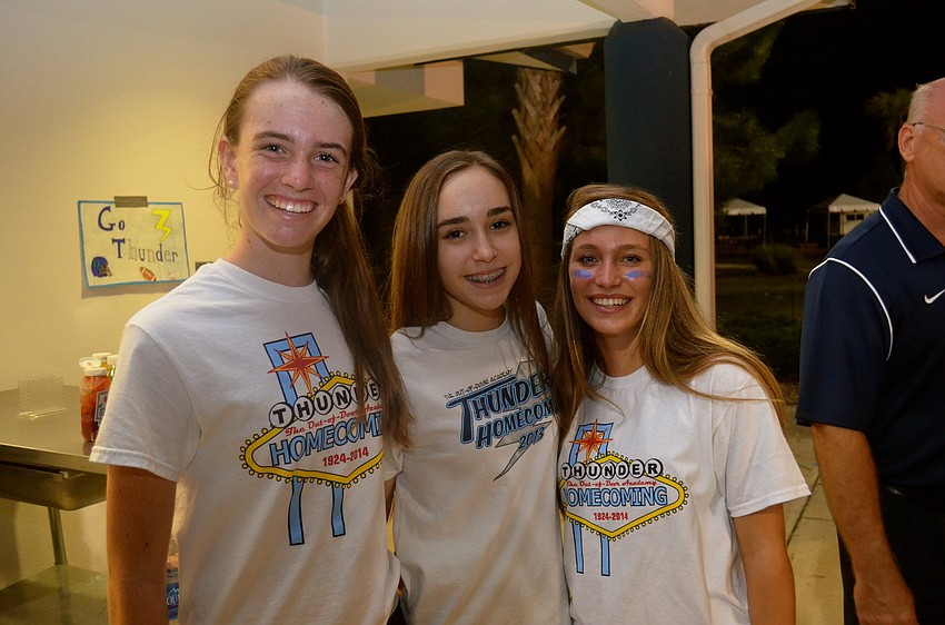 Adelaide Mahler, Emma Donato and Hannah Bizick sport homecoming T-shirts.
