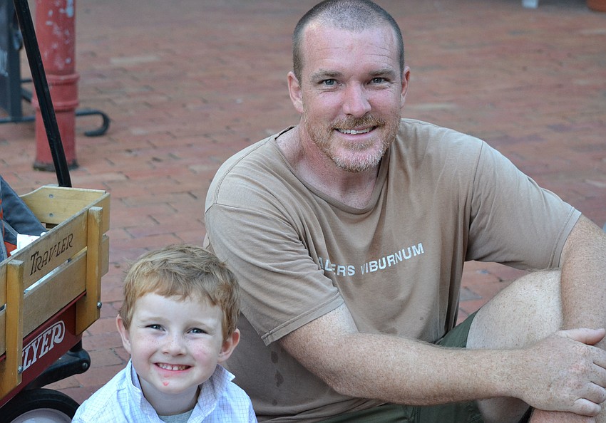 Henry and James Caudell take in the music at Rock for a Cause.