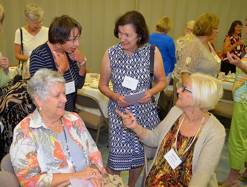 Mary Ann Fair, Rochelle McKenney, Dorothy Williams and Claire Arbour enjoy time with new and old friends.