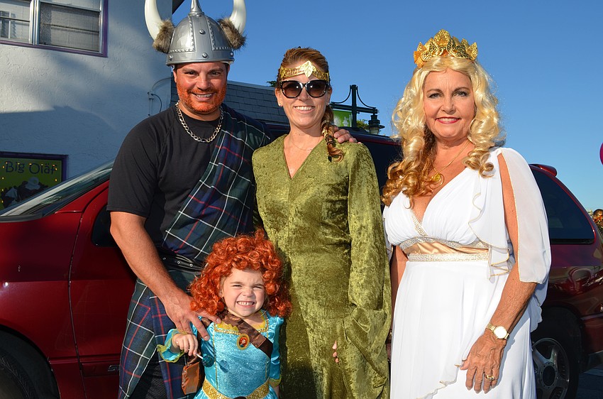 The Medeiros family of Tony, Francine, Mikayla and Kathy dressed as characters from Disneyâ€™s Brave and a Greek goddess.