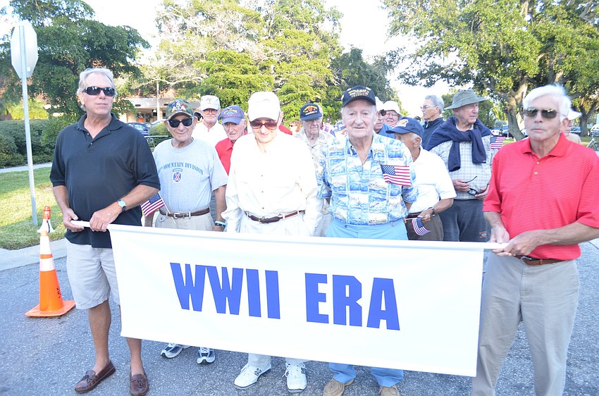 World War II veterans march in the parade.