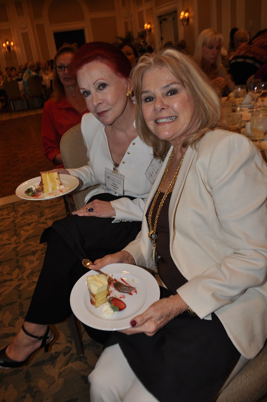 Eileen Schineller, of The Landings, eats dessert with Mary Burke Kramer, of Lakewood Ranch, as the fashion show begins.