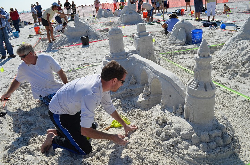 The team of William Pratesi and Mike Bradley work on â€œGoing Baroqueâ€ for the amateur competition.