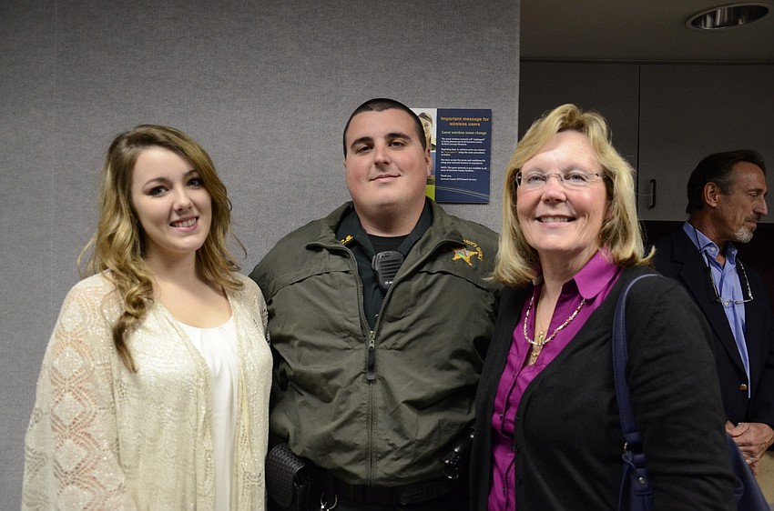 Commissioner Alan Maio's family came to the welcoming reception in support: Melody Martin, Maio's son's fiancee, Adam Maio, his son, and his wife Nancy Maio.