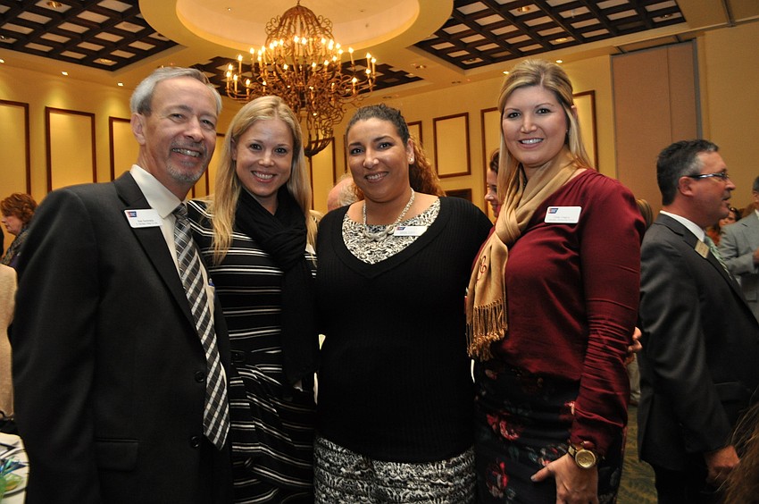 Bob Summers, Jeana Schmidt, Natalie Chambers and Emily Gregory represent the American Cancer Society.
