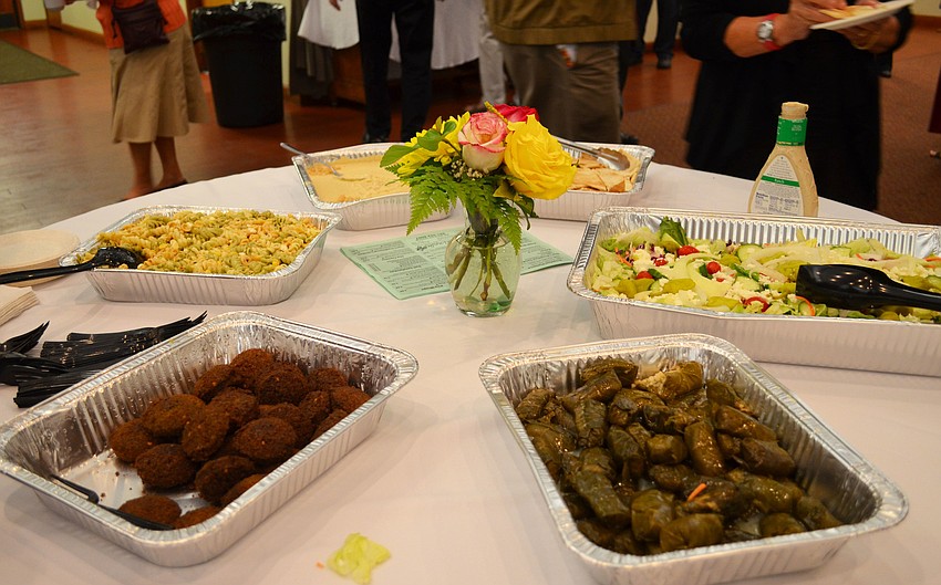 Following the service guests enjoyed light refreshments that included hummus, pita bread and falafel.