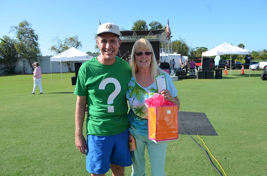 Holly Baran, with Michael Ganey, celebrates winning the second prize of the raffle.