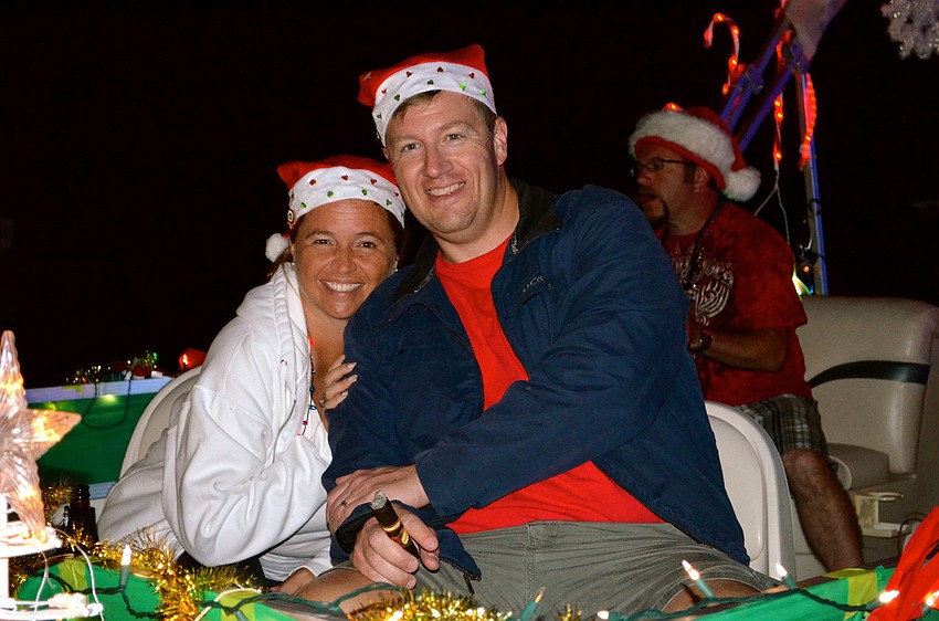 Maria and Mike Amenta enjoy a ride on their decorated boat.