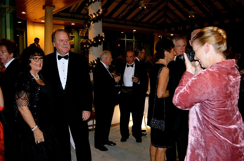 Kris and Tom Higgerson pose for a photo taken by Andi Watson, of Just for Girls.