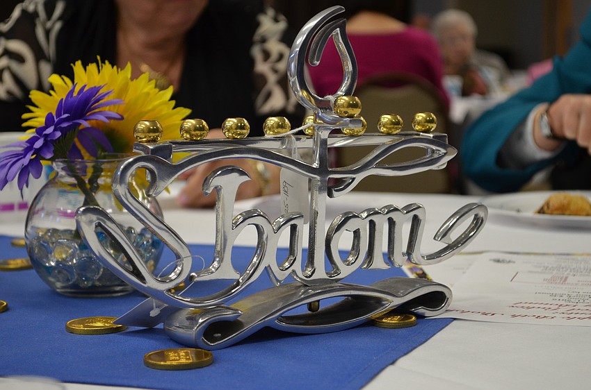 Menorahs at the center of each table were available to purchase through the Judaic Shop.