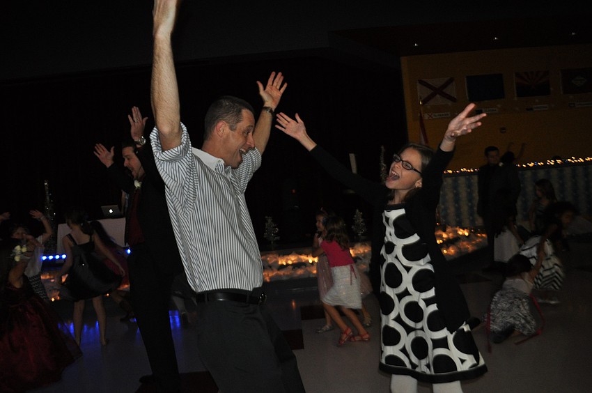 Alex and Orianna Pineda dance the YMCA.