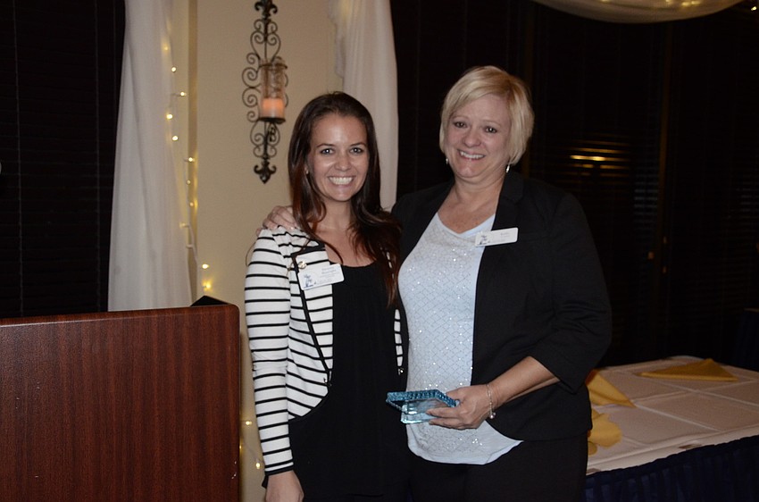 Desiree Hanright presented Kathy Judkins with the Visitor's Center Volunteer Award.