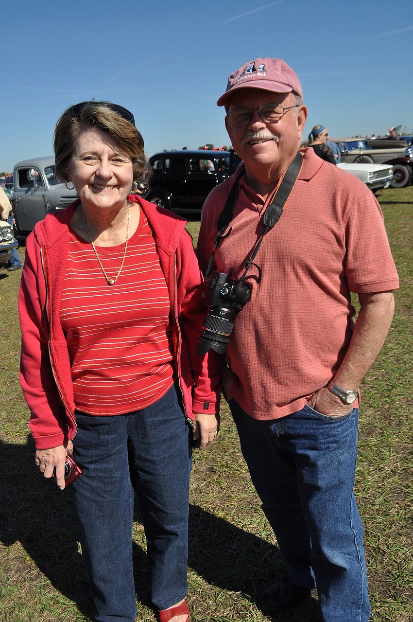 Julie and Phil McCabe peruse the rows of cars.