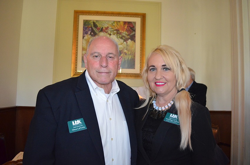 Vince LaPorta, of the Longboat Key Club, and Penelope Mabry, of Servpro of Bradenton