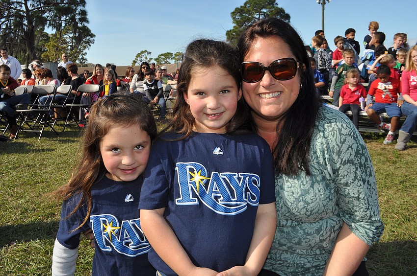 Taylor and Sydney Mitchell have fun with their mom, Dana.